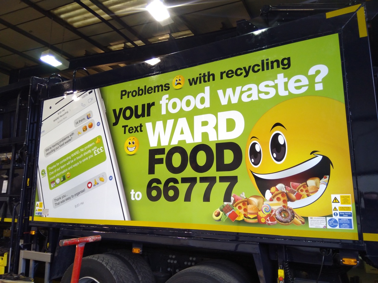 Picture of Ward Recycling's food waste truck with emoji graphics
